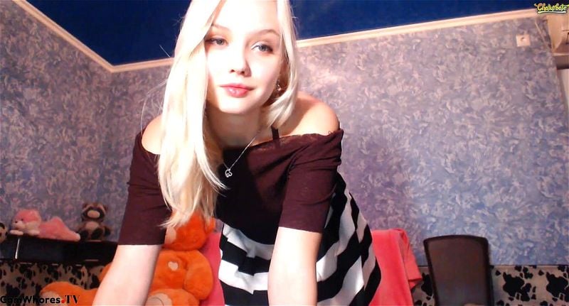 Cute young blonde Gentleflower23 teases in dress on livechat
