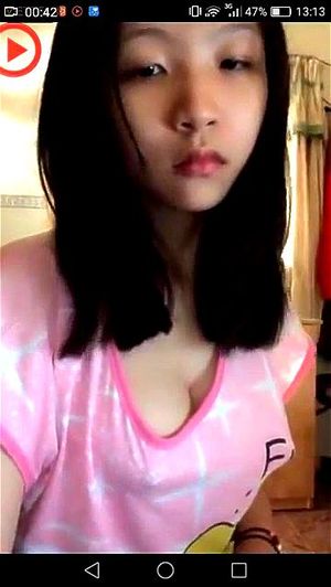 Asian chick showing her hard nipples on webcam