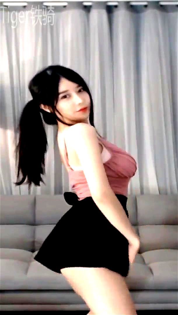 Dressed Asian teen teases on webcam