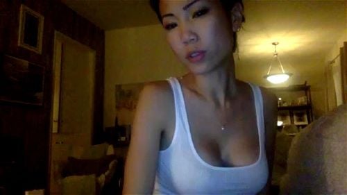 Busty Asian babe Joan Wayne webcam chat 1/2